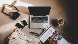 Laptop coffee book table scene - art station free wallpaper