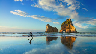 Beach walking person rock formation 2 - douglas robertson bisset free wallpaper
