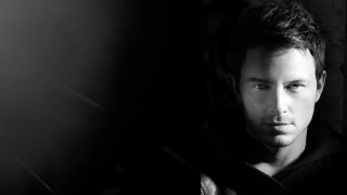 Serious man black background image - his face free wallpaper