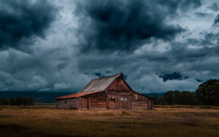 Barn field stormy sky dark - a barn in a field free wallpaper