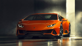 Bright orange sports car dark - fog free wallpaper