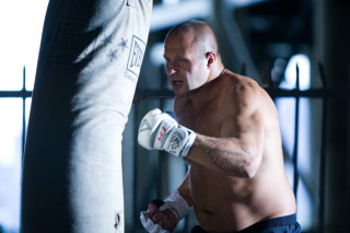 Man boxing shirtless punching bag - expressionism free wallpaper
