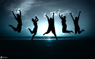 Beach night jumping group sunshine - night time free wallpaper