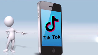 Person pointing tiktok phone screen - futurism free wallpaper