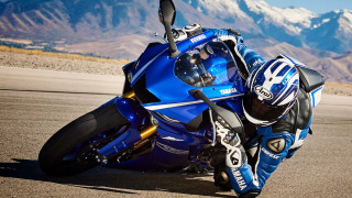 Motorcycle leaning person mountains background - the background in the background free wallpaper