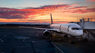 Plane parked runway sunset dawn - colorful free wallpaper