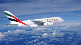 Jetliner flying blue cloudy sky 5 - the side of the plane free wallpaper
