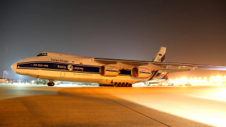 Large jetliner airport tarmac night - private press free wallpaper