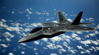 Fighter jet flying blue cloudy - a blue cloudy sky free wallpaper