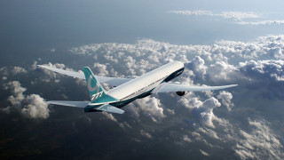 Large passenger jet cloudy sky 4 - a cloudy sky above the clouds free wallpaper