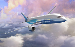 Large passenger jet cloudy sky - a cloudy sky free wallpaper