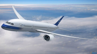 Large jetliner flying cloudy blue - a jet engine free wallpaper