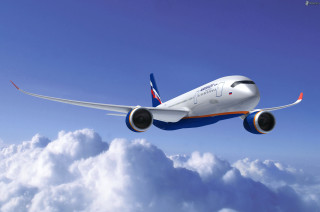 Large jetliner blue sky above - a blue tail free wallpaper