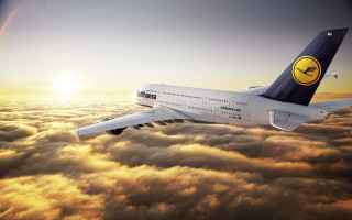 Jetliner cloudy sky above clouds 2 - a smiley face free wallpaper