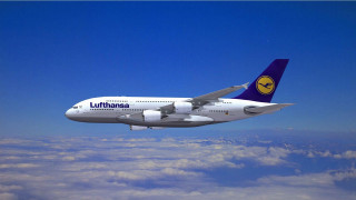 Jetliner flying blue sky clouds 9 - the side of the plane free wallpaper