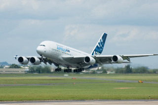 Jetliner taking off airport runway 5 - an airport runway free wallpaper
