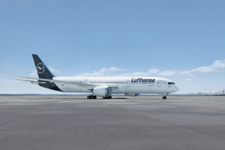 Large jetliner airport tarmac blue - side profile free wallpaper