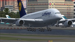 Jetliner city runway buildings skyline - a runway free wallpaper