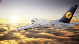 Large jetliner cloudy sky smiley - dawn free wallpaper