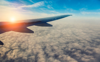 Plane flying sky sun shining 2 - liminal free wallpaper