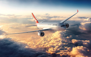 Jetliner flying cloudy sky above 4 - a cloudy sky above the clouds free wallpaper