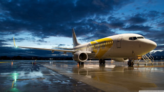 Jetliner airport tarmac night cloudy - top of an airport tarmac free wallpaper