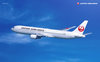 Japan airlines jet flying blue - a blue sky background free wallpaper