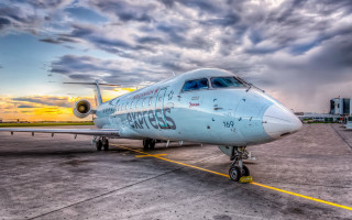 Large passenger jet airport tarmac - private press free wallpaper