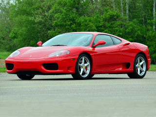 Red sports car parked forest - a forest in the background free wallpaper
