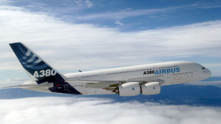Jetliner flying blue cloudy sky 2 - free airplane wallpaper