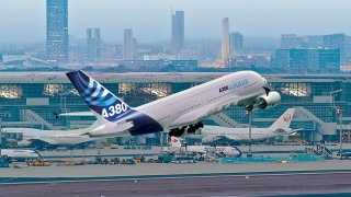 Large passenger jet taking off - an airport runway free wallpaper