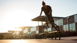 Man riding bike wooden bench - dennis flanders free wallpaper