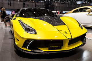 Yellow sports car showroom display - a yellow sports car free wallpaper