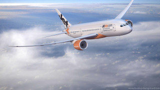 Large jetliner cloudy sky white - a cloudy sky above the clouds free wallpaper