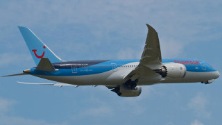 Large blue white airplane flying 5 - the side of the plane free wallpaper