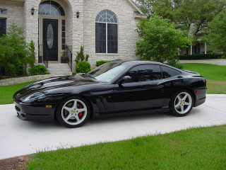 Black sports car driveway house - matte finish free wallpaper