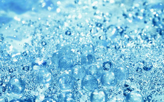 Water bubbles blue background underwater - a surface of water free wallpaper