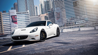 White sports car cityscape fence - skyscraper free wallpaper