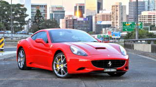 Red sports car city skyline 9 - the side of the road in front free wallpaper