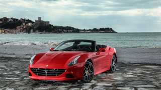 Red sports car cobblestone road - a matte painting free wallpaper for desktop