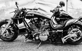 Black white motorcycle parked building - ed roth free wallpaper