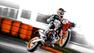 Motorcycle trick air track train - a train in the background free wallpaper