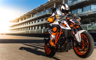 Motorcycle ride road building balcony - a person riding free wallpaper